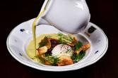 Soup with poached egg, mushrooms